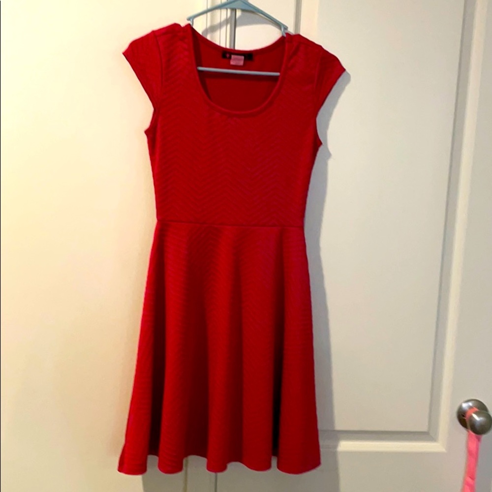 My daughter has outgrown her favorite dress.